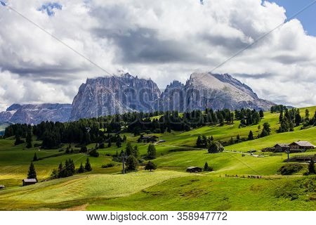View Of Alpe Di Siusi With Gruppo Del Sassolungo Mountains In The Background