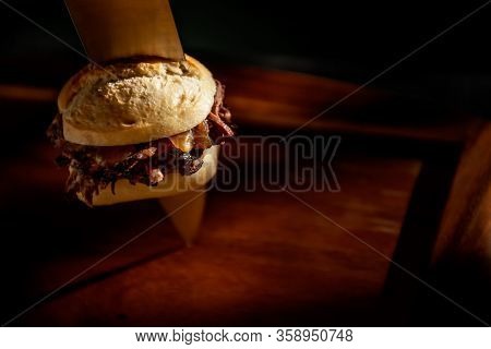 Gourmet Pulled Pork Burger With Kitchen Knife