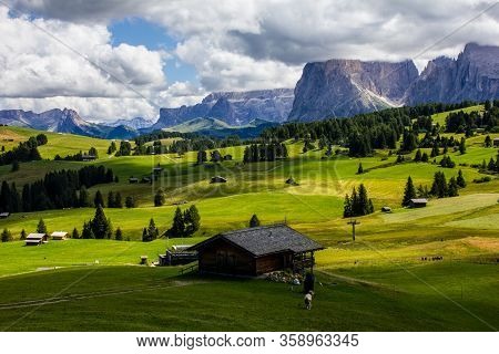 Seiser Alm With Sella And Langkofel Mountains In The Background