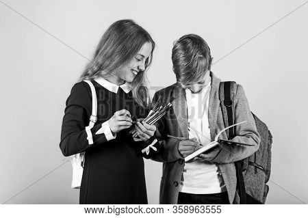 Before Examination. Small Children Prepare For Examination. Little Girl And Boy Hold Examination Pap