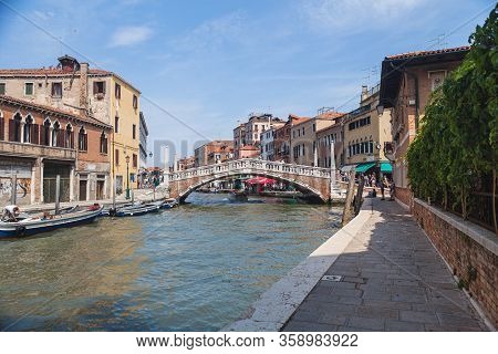 Venice, Italy - June 15, 2016 View Of The Ponte Delle Guglie Bridge Of Spires Over The Canaregio Can