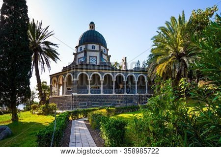 High shore of Lake Tiberias. The Catholic Church of the Beatitudes of the Franciscan monastery on Mount Bliss in the Galilee. Israel. The concept of religious pilgrimage, ethnographic, photo tourism
