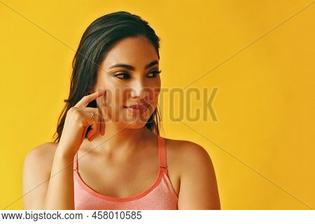 Headshot Beauty Shot Of Smart Thoughtful Hispanic Latina Woman Smiling With Hand On Chin Young Adult
