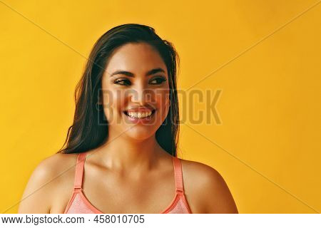 Headshot Beauty Shot Of Hispanic Latina Woman Toothy Smile Young Adult With Black Long Hair And Tank