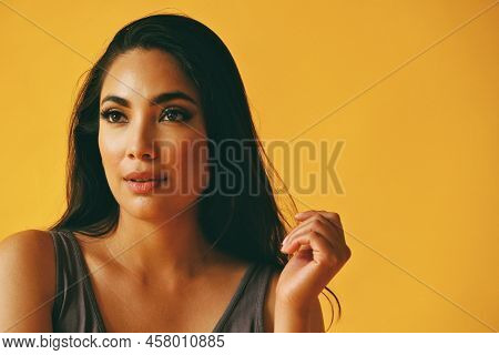 Headshot Beauty Shot Of Hispanic Latina Woman Smiling Young Adult With Black Long Hair And Tank Top 