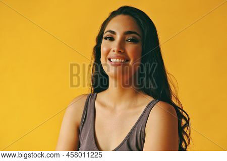 Headshot Beauty Shot Of Hispanic Latina Woman Smiling Young Adult With Black Long Hair And Tank Top 
