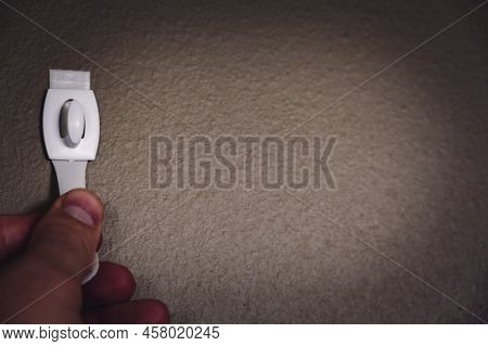 Selective Focus On Adhesive Strip Wall Hanger That Can Be Removed By Pulling Tape