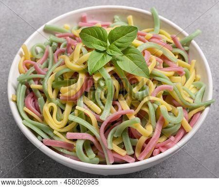 Colored Noodles From Durum Wheat Based On Vegetables And Herbs. Pasta Flavored With Spinach, Beetroo