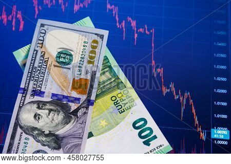 Us Dollar And Euro Banknotes Over Digital Screen With Real Life Exchange Chart, Usd Eur Parity Conce