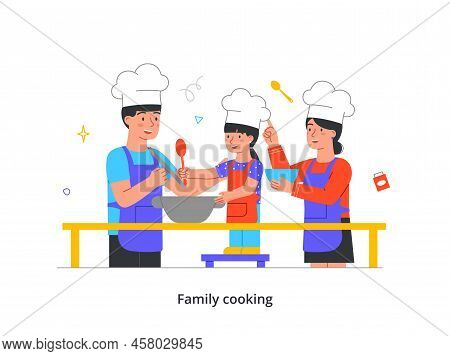Family Home Activities Concept. Parents And Child In Apron Prepare Delicious Food In Kitchen. Smilin