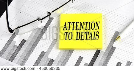 Word Attention To Details On Yellow Sticky On The Chart Background