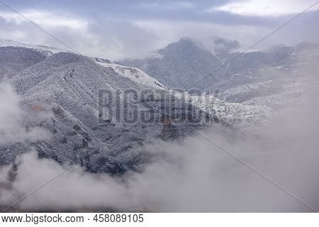 Panoramic View From The Gunib Village, Dagestan, Russia. Snow-capped Mountains And Autumn Fields. Be