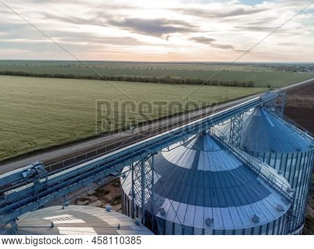 Grain Elevator. Metal Grain Elevator In Agricultural Zone. Agriculture Storage For Harvest. Grain Si