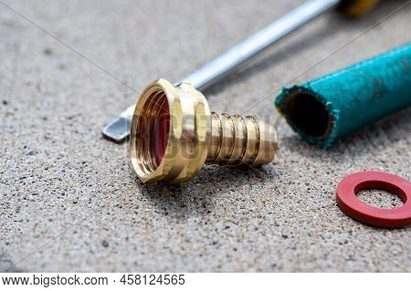 New Garden Hose Replacement Connection And Pipe Mender To Tighten And Secure Repair.