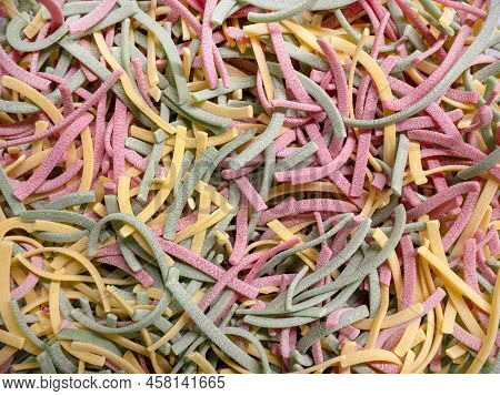 Colored Noodles From Durum Wheat Based On Vegetables And Herbs. Pasta Flavored With Spinach, Beetroo