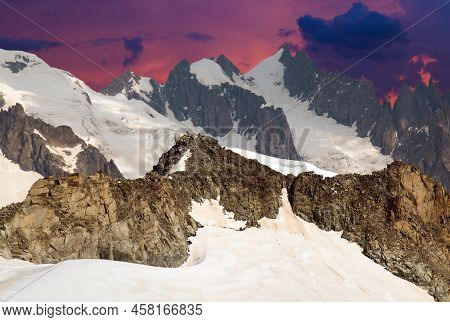 Mont Blanc Massif At Twilight With Alpine Afterglow In The Summer Season