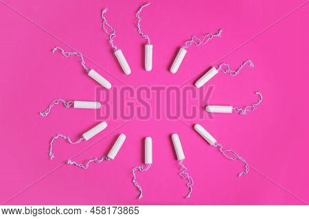 Medical Female Tampon On A Pink Background. Hygienic White Tampon For Women. Cotton Swab. Menstruati