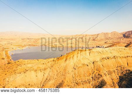 Aerial View Tourist Walk Excited On Unique Texture Colorful Rainbow Desert Canyons In Mravaltskaro W