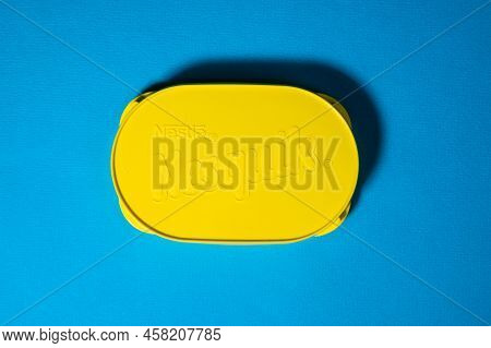 Tyumen, Russia-may 11, 2022: Nestle Nesquik Cocoa Logo. Blue Background. Selective Focus