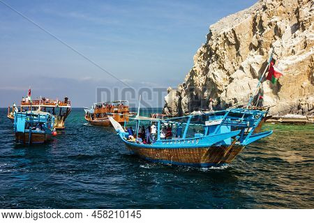 Khasab, Oman - May 27, 2022: Tourist Dhow Boats, Musandam Peninsula Fjords.