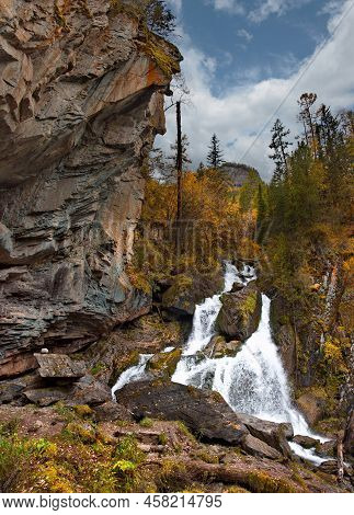 Russia. South Of Western Siberia. One Of The Many Most Beautiful Waterfalls Of The Altai Mountains O