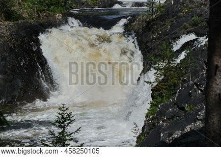 The Concept Of Travel In Russia. The Kivach Nature Reserve In Karelia Is Popular Tourist Destination