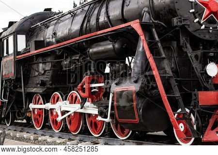 Side View Steam Locomotive With Red Wheels With Red Wheels With Big Red Star. Retro Locomotive On Ra