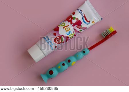 June 1, 2022 Ukraine City Kyiv Toothpaste For Children Aquafresh On A Colored Background
