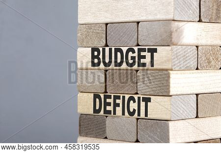 The Text On Wooden Blocks Budget Deficit