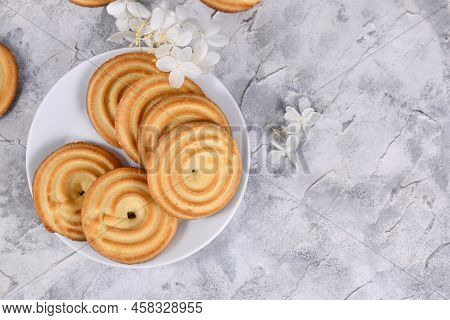 Round Ring Shaped Spritz Biscuits, A Type Of German Butter Cookies Made By Extruding Dough With A Pr