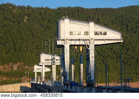 Giant Cranes For Adjusts The Valves During Floods On Hydroelectric Power Station Of Krasnoyarsk Dam 