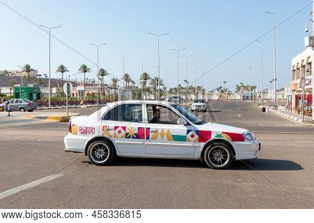 Egypt, Sharm El Sheikh - July 02, 2022: A Taxi On The City Street In Sharm El Sheikh, Egypt