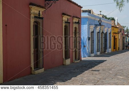 Oaxaca, Oaxaca, Mexico- May 26, 2022: Colorful Houses At The Street In A Sunny Day At Oaxaca, Mexico