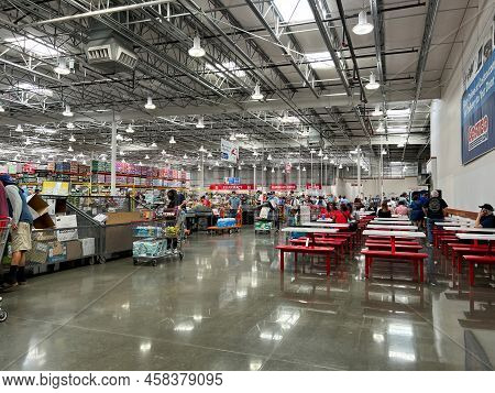 Orlando,fl Usa -october 31, 2021: People Walking Out Of A Costco Wholesale Retail Store In Orlando, 