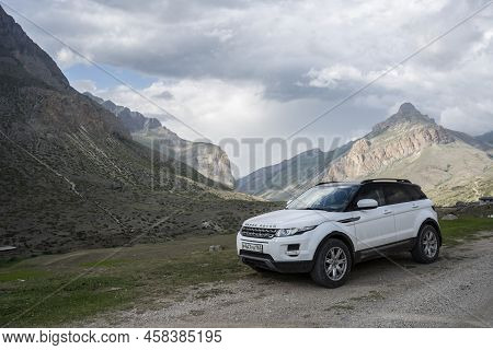 Range Rover Evoque Car On The Background Of The Mountains Of The North Caucasus In Russia. Sunny Day
