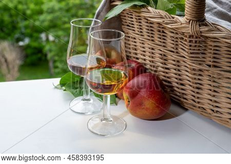 Tasting Of Strong Alcoholic Drink Calvados Made From Apples In Normandy, Calvados Region, France