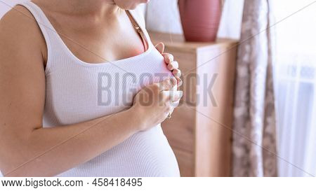 Breast Exam Cancer Woman Check. Happy Young Pregnant Woman Self Exam. Breast Self Exam. Health, Medi