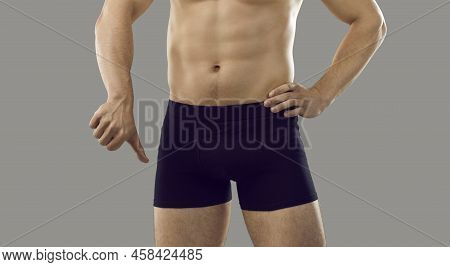 Young Man Who Is Having Problems With Getting An Erection Is Showing A Thumbs Down