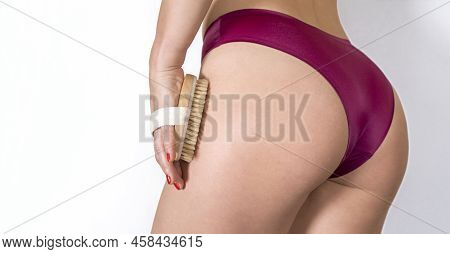 Beautiful Toned Womens Buttocks In Red Underwear Panties On A White Background. Muscle Tone, Body Ca