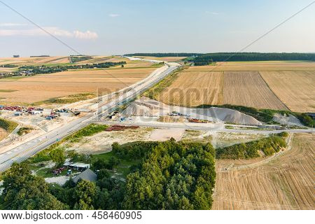 Aerial View Of Kielce-krakow Highway Construction Site In Sunny Summer Evening, Lesser Poland Voivod