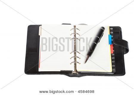 Agenda aperta con penna