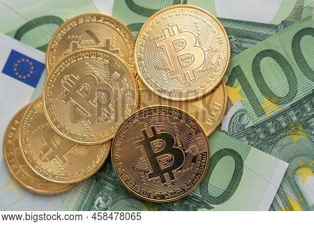 Euro Money And Bitcoin Coins, Financial Concept Of Global Economic Crisis.