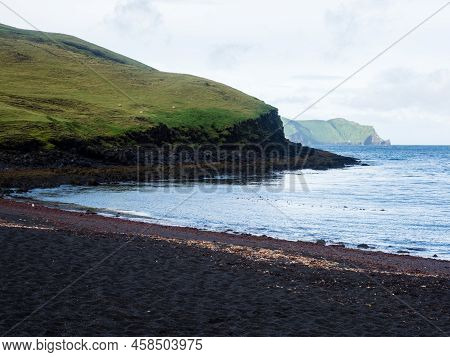 Black Volcanic Sand On Klauf Beach, Heimaey Island - Westman Islands, Iceland