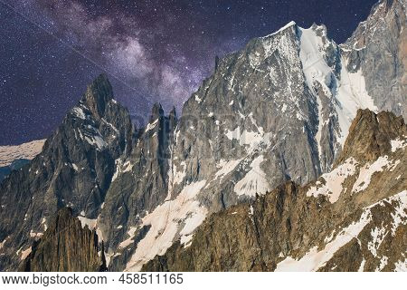 Alpine Landscape With Night Sky And Milky Way Over Pointe Helbronner Of The Massif Of Mont Blanc, Fr