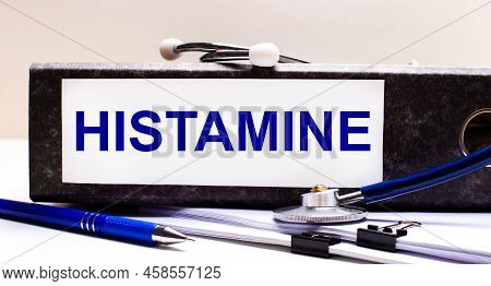 The Desktop Has A Stethoscope, A Blue Pen, And A Gray File Folder With The Text Histamine. Medical C