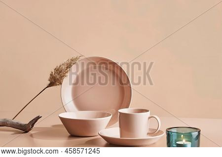 Set Of Modern Pink Utensilis On The Table