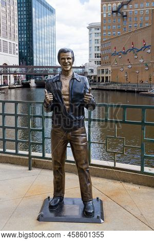 Milwaukee, Wi, Usa April 19 2022: Refurbished Bronze Fonz Statue Happy Days Character Tribute In Dow