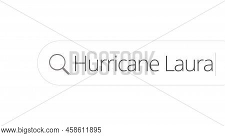 Searching For Information About Hurricane Laura In The Internet Browser. Typing In A Search Line On 