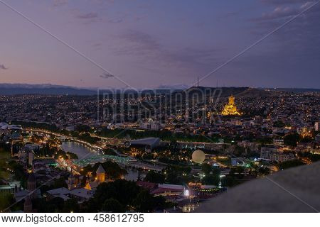 Tbilisi, Georgia- July 13 2022: Tbilisi, Georgia Night Panoramic View From Top Of Fortress Of Narika
