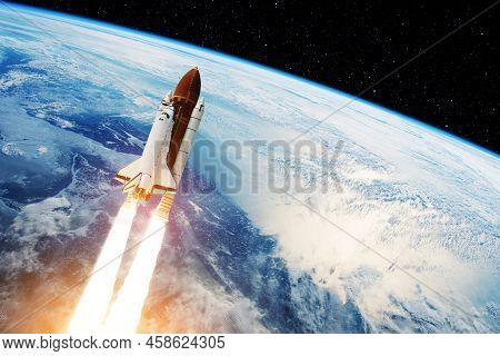 Spaceship Lift Off. Space Shuttle With Smoke And Blast Takes Off Into The Starry Sky. Rocket Starts 
